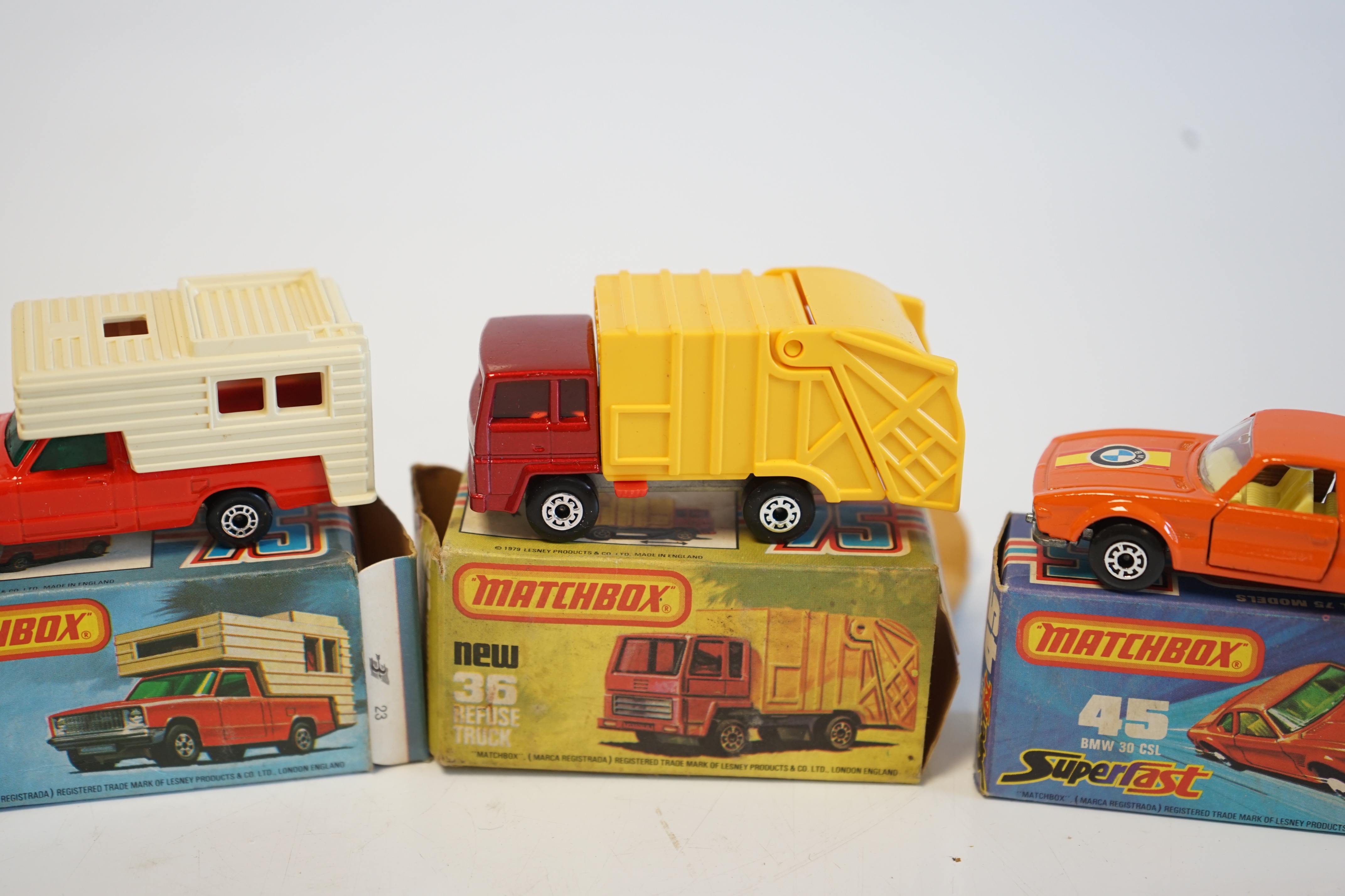 Seventeen boxed Matchbox Series 1-75 diecast vehicles including; 14; Petrol Tanker, 28; Formula Racing Car and another, 31; Caravan, 35; Zoo Truck, 36; Refuse Truck, 38; Camper, 45; BMW 30 CSL, 63; 4x4 Open Back Truck, 6